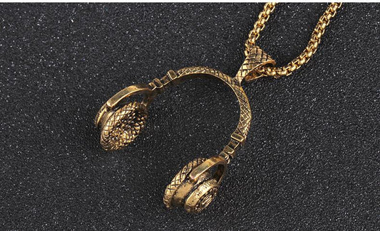 Necklace with headphones in gold fashion accessory