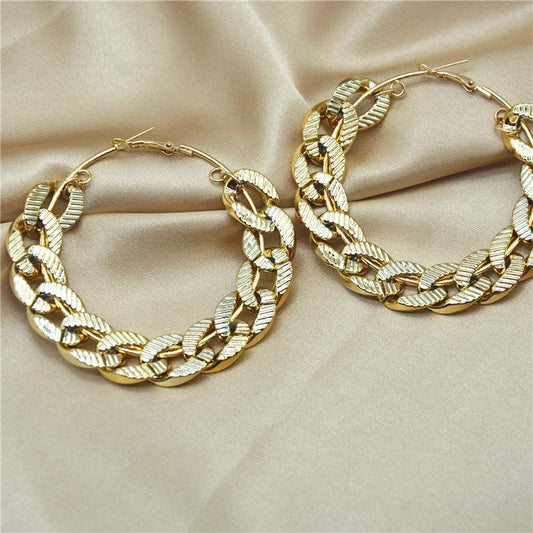 Large hoops with chains in gold hip-hop statement elegance