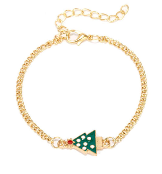 Beautiful bracelet in gold with a Christmas tree with white balls